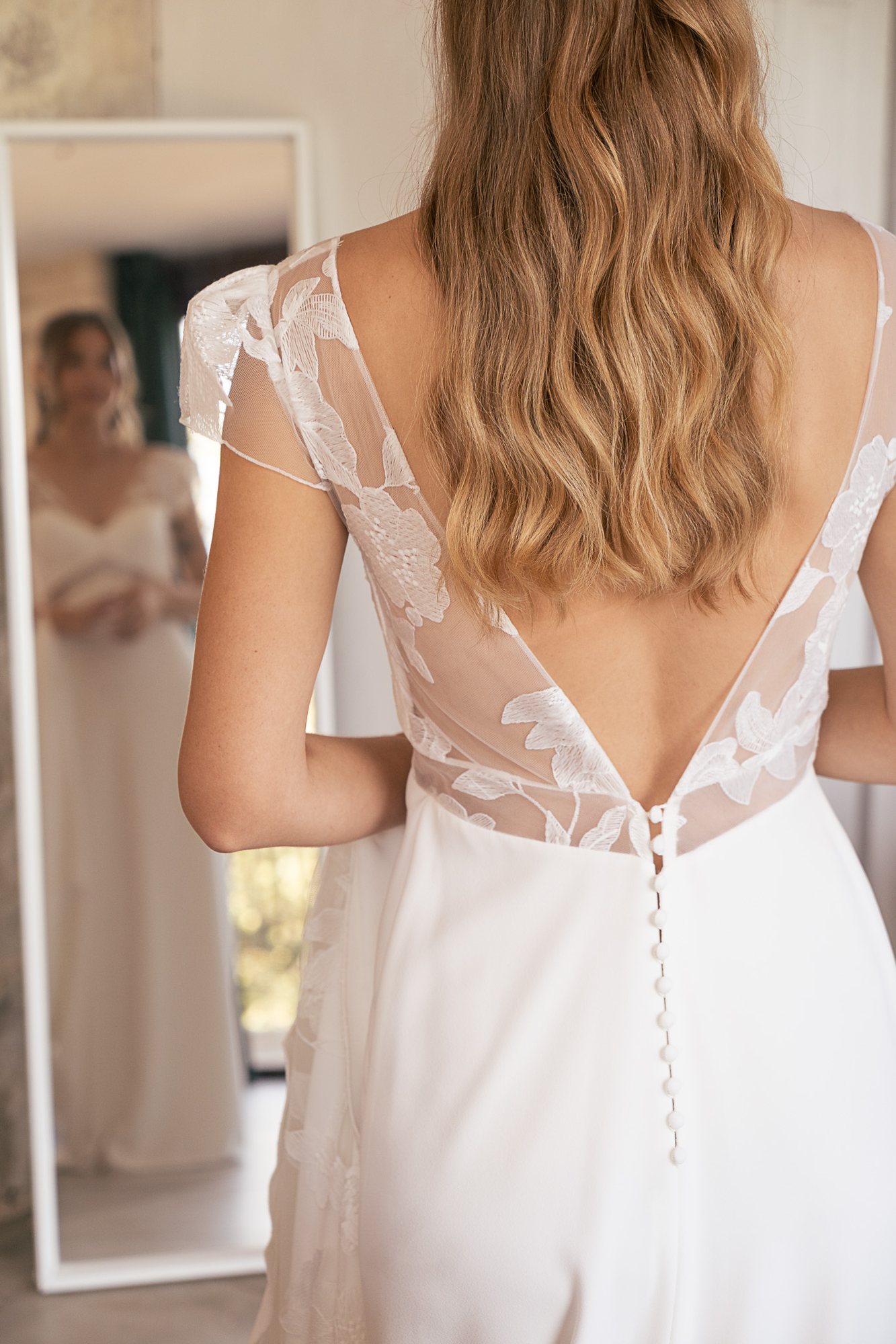 Dos de la robe de mariée en dentelle